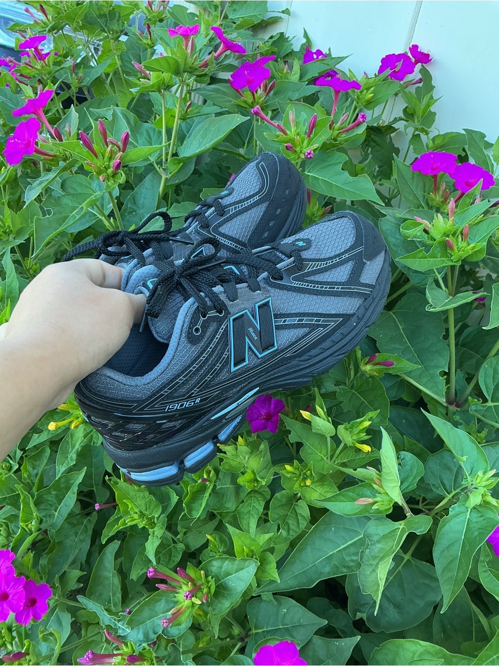 New Balance men Gray and Teal Athletic Sneakers